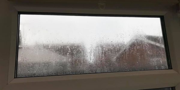 Blown misted glass window